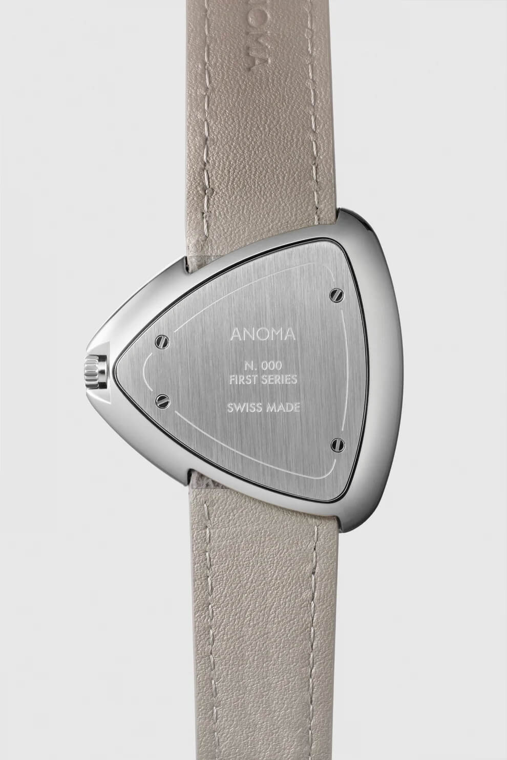 close-up of the Anoma A1 strap entering the case through a slender opening with no lugs