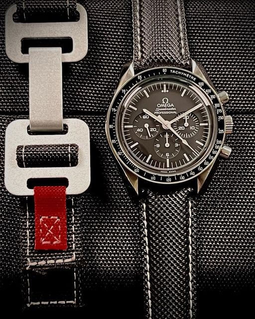 Omega Speedmaster on sailcloth strap by Fin Watch Straps