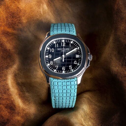 Patek Aquanaut on custom blue strap by Gunny Straps 