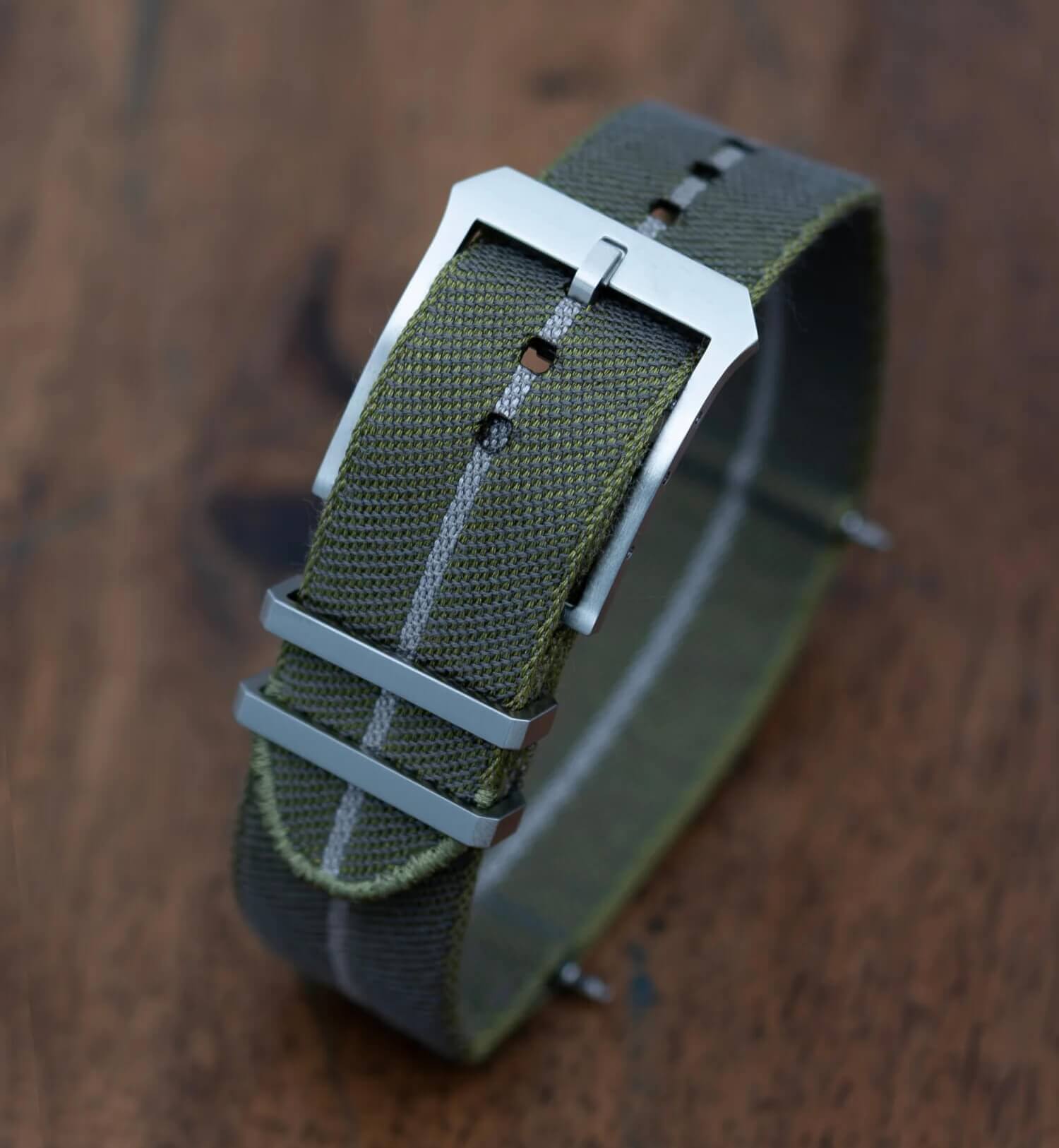 Julien Faure Jacquard-woven textile watch strap on a dive watch
