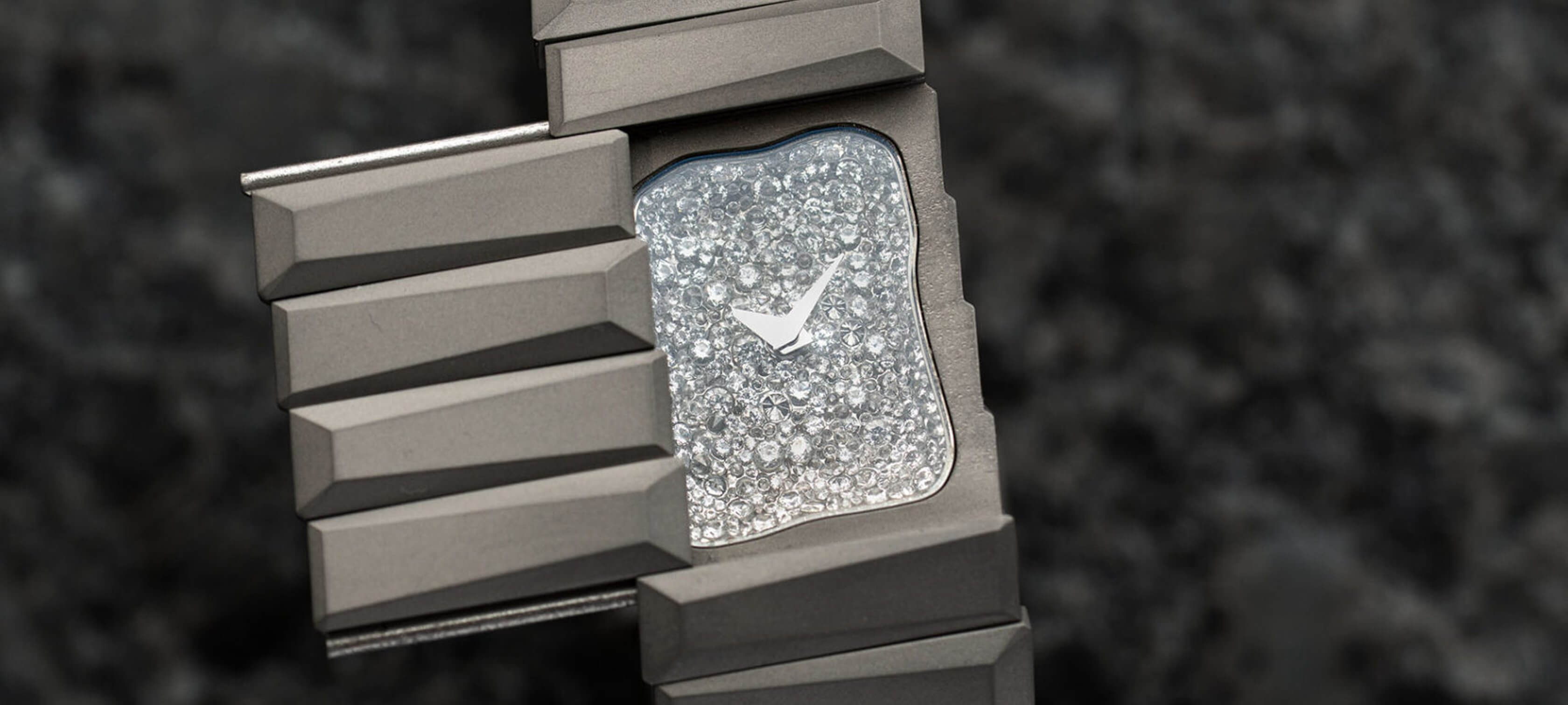 Toledano and Chan Oshinobi titanium bracelet watch with the cover closed