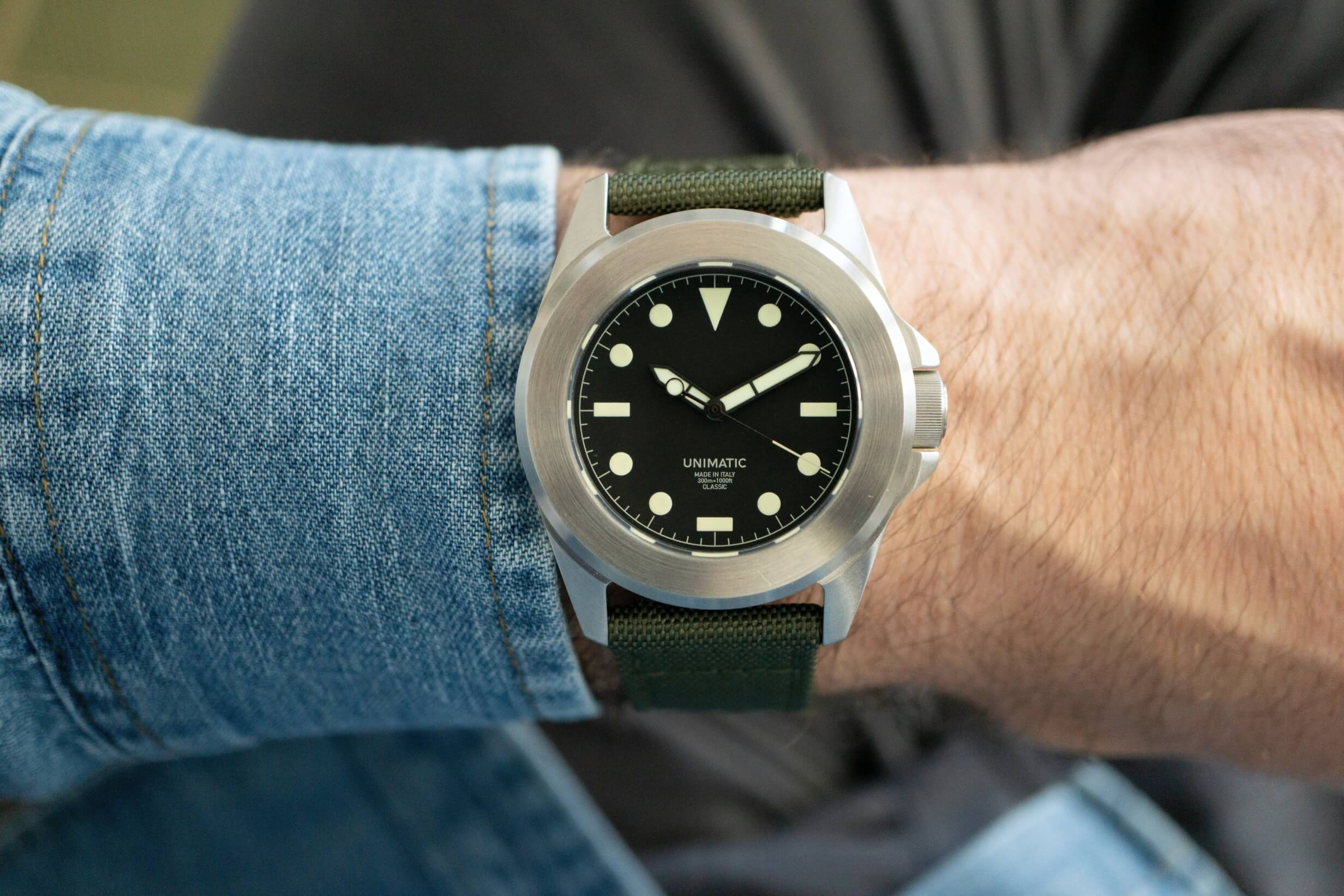 green sailcloth strapon an Unimatics watch