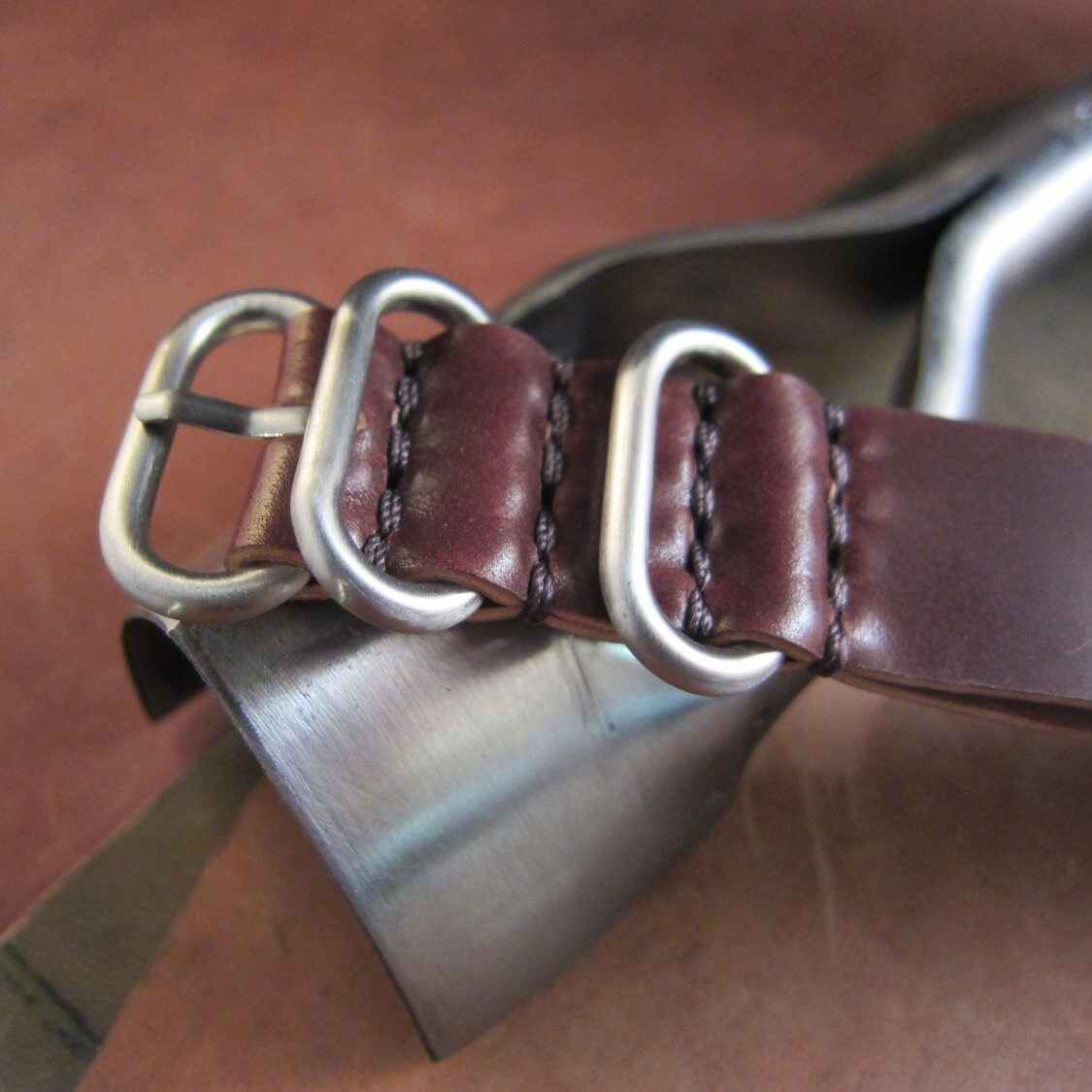 Heavy-duty pass-through leather strap by Rover Haven