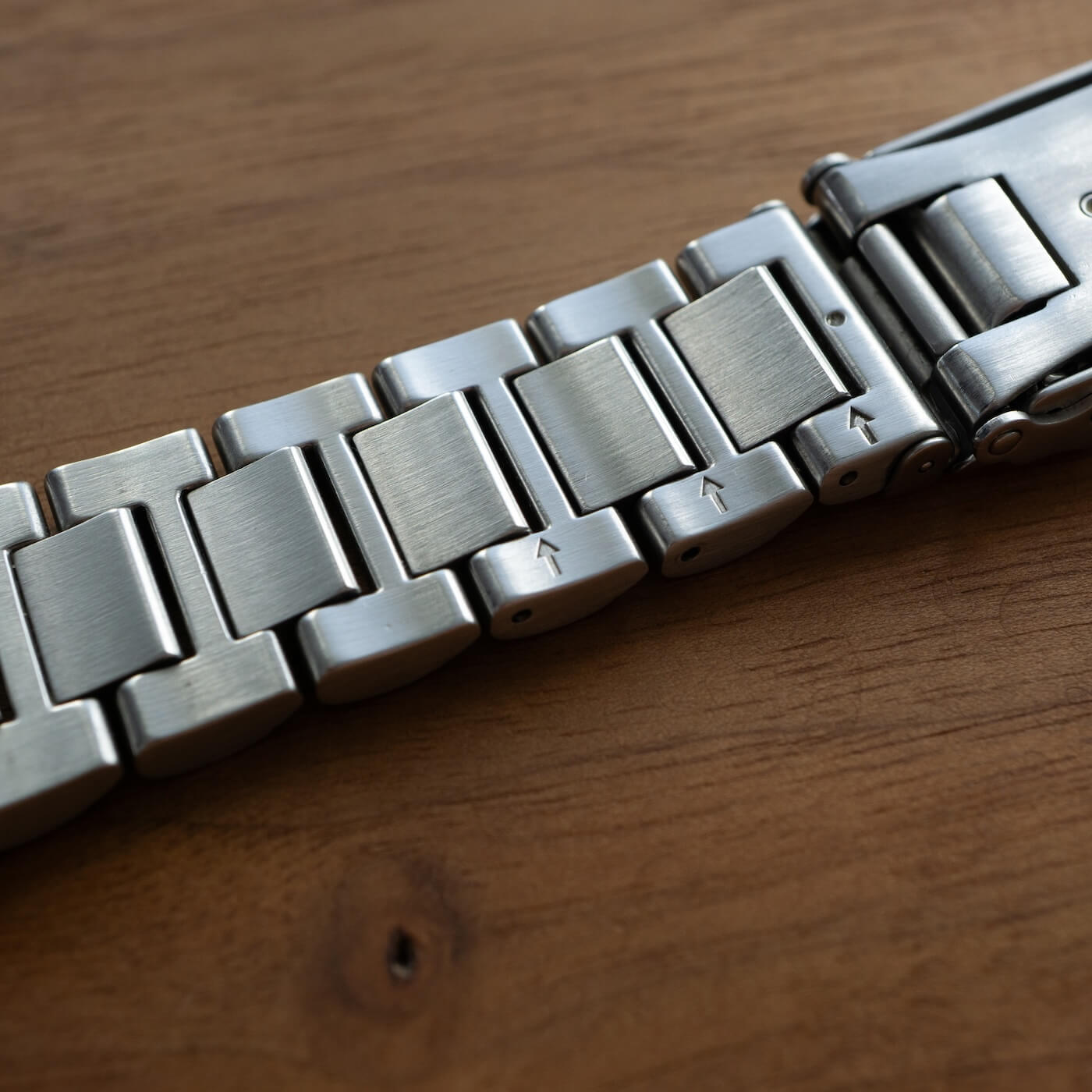 arrows indicate which way to push the pin out