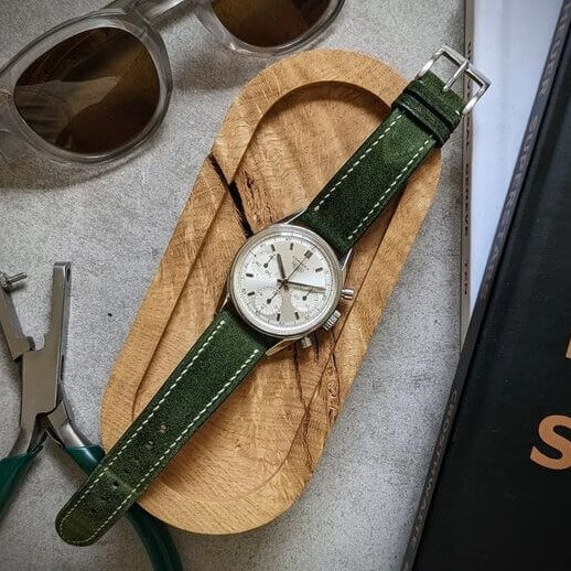 The Strap Tailor green leather watch band on Tag chronograph